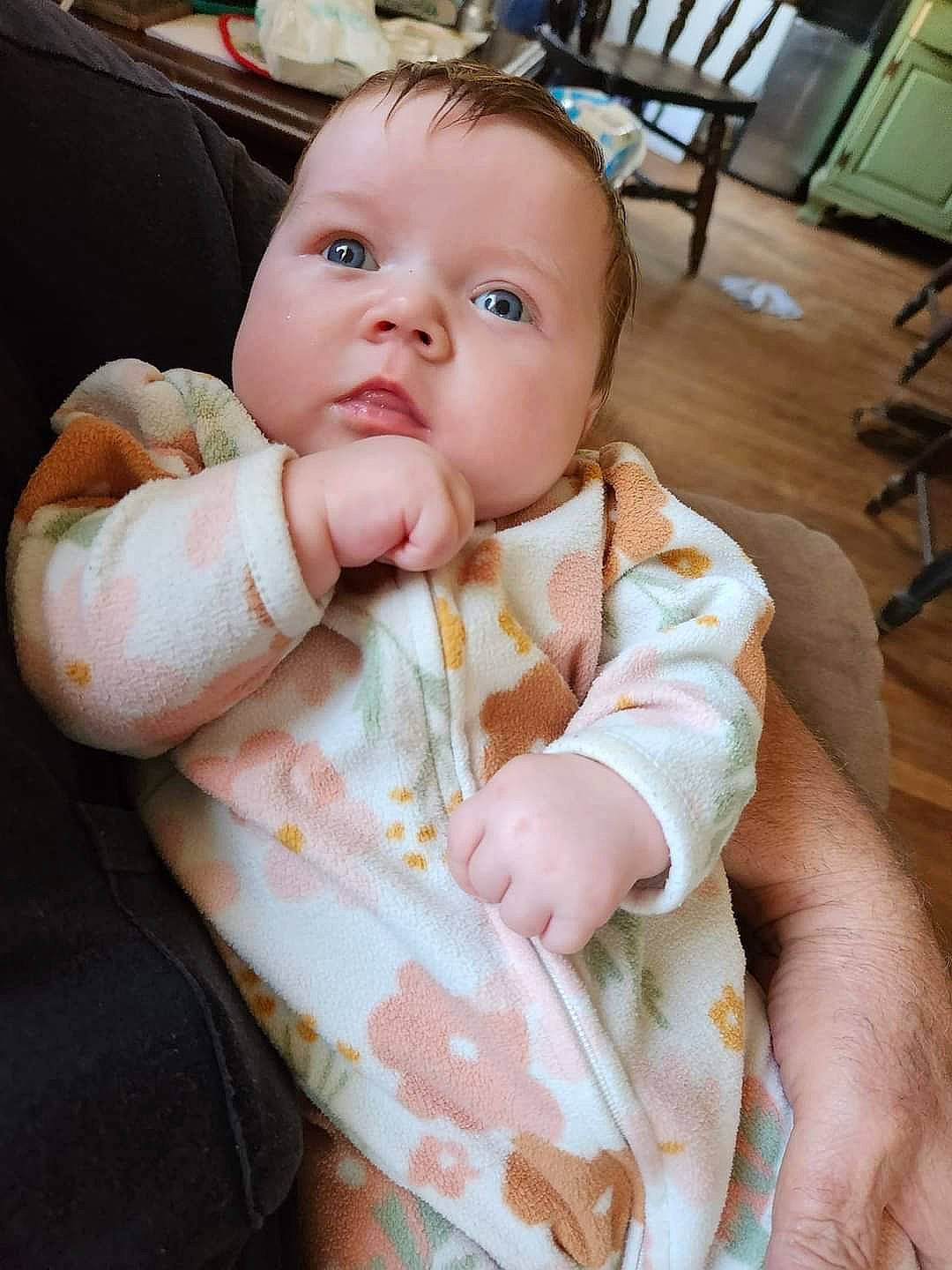 Harley is registered to the contest to win money with this photo: baby, baby_toddler_clothing, chair, cheek, chest, comfort, elbow, flooring, gesture, iris, lip, mouth, nail, neck, nose, person, skin, sleeve, thumb, toddler