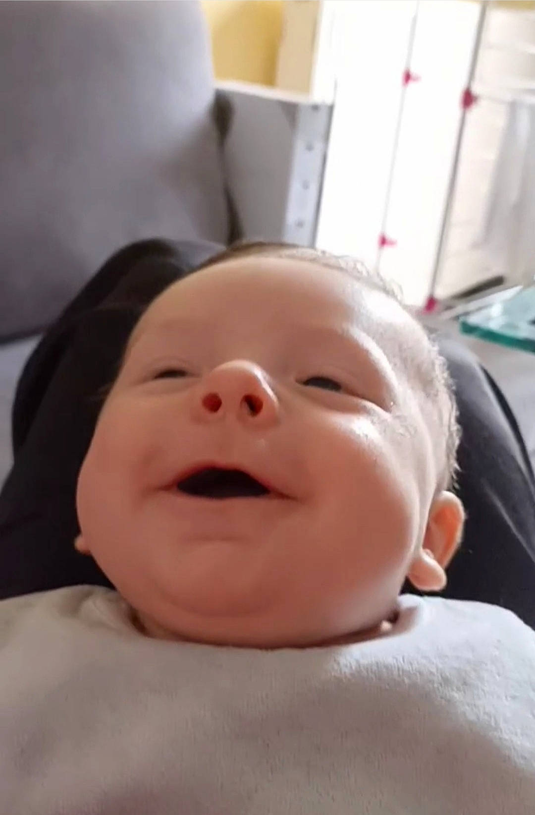 Logan participe au concours pour gagner de l'argent avec cette photo : baby, baby_toddler_clothing, cheek, child, chin, comfort, eye, eyebrow, eyelash, fun, gesture, happy, laugh, lip, mouth, nose, person, skin, smile, toddler