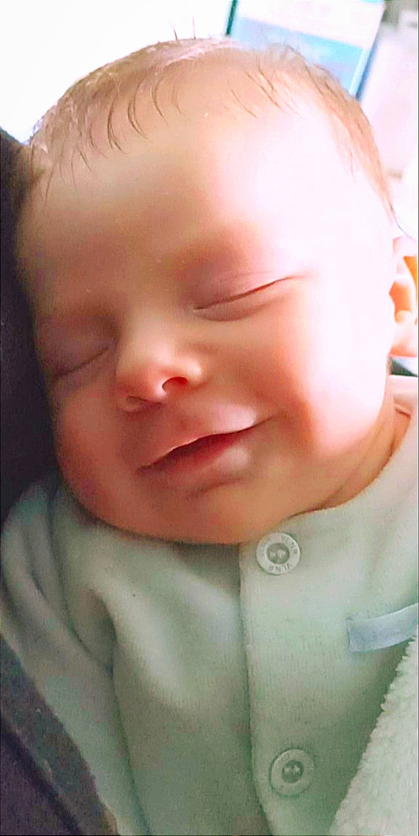 Logan participe au concours pour gagner de l'argent avec cette photo : baby, baby_toddler_clothing, cheek, child, chin, close_up, ear, eyebrow, eyelash, grass, happy, iris, lip, mouth, nose, pattern, person, portrait_photography, skin, sleeve