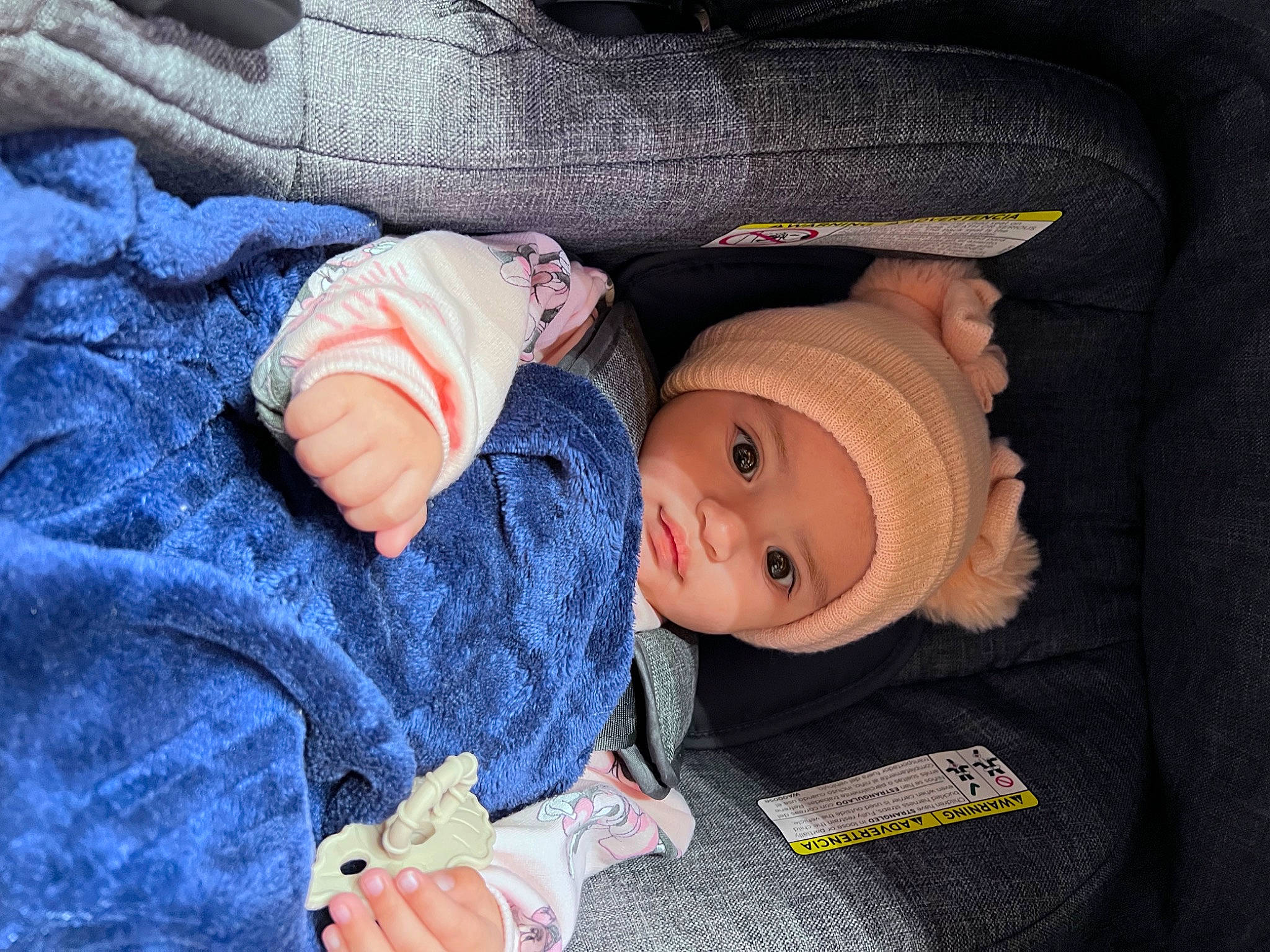 Aubrey joined the competition — help win amazing prizes! baby, baby_products, baby_toddler_clothing, cap, cheek, child, comfort, eye, face, finger, gesture, hat, head, headgear, headwear, human_body, knit_cap, person, skin, sleeve