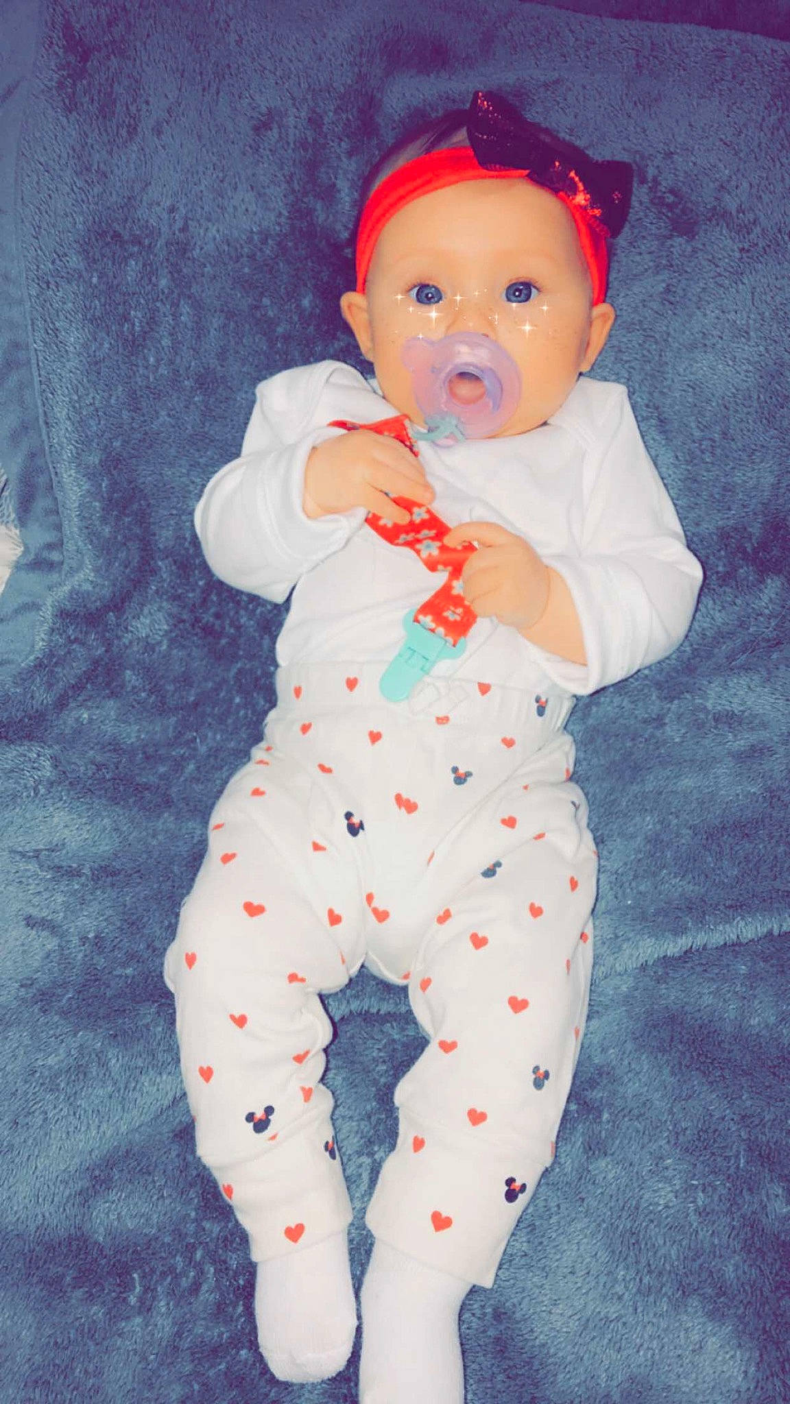 Ariella is registered to the contest to win money with this photo: baby, baby_products, baby_toddler_clothing, cheek, child, headband, nightwear, peach, person, toddler