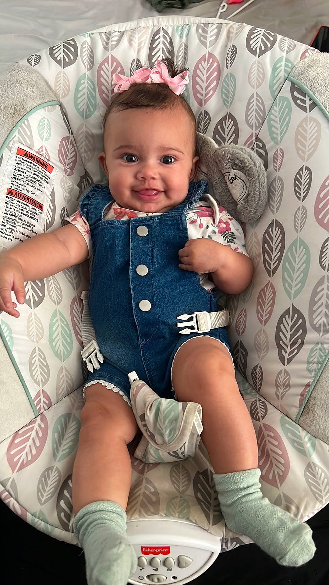 Ivy Rose is registered to the contest to win money with this photo: arm, baby, baby_toddler_clothing, cheek, child, collar, comfort, dress, finger, happy, human_leg, joy, knee, pattern, person, pink, product, skin, sleeve, smile