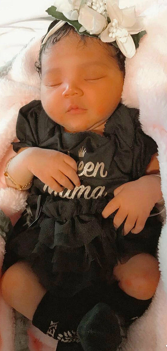 Jordynn is registered to the contest to win money with this photo: arm, baby, baby_toddler_clothing, black_hair, cheek, child, finger, person, product, skin, thumb, toddler