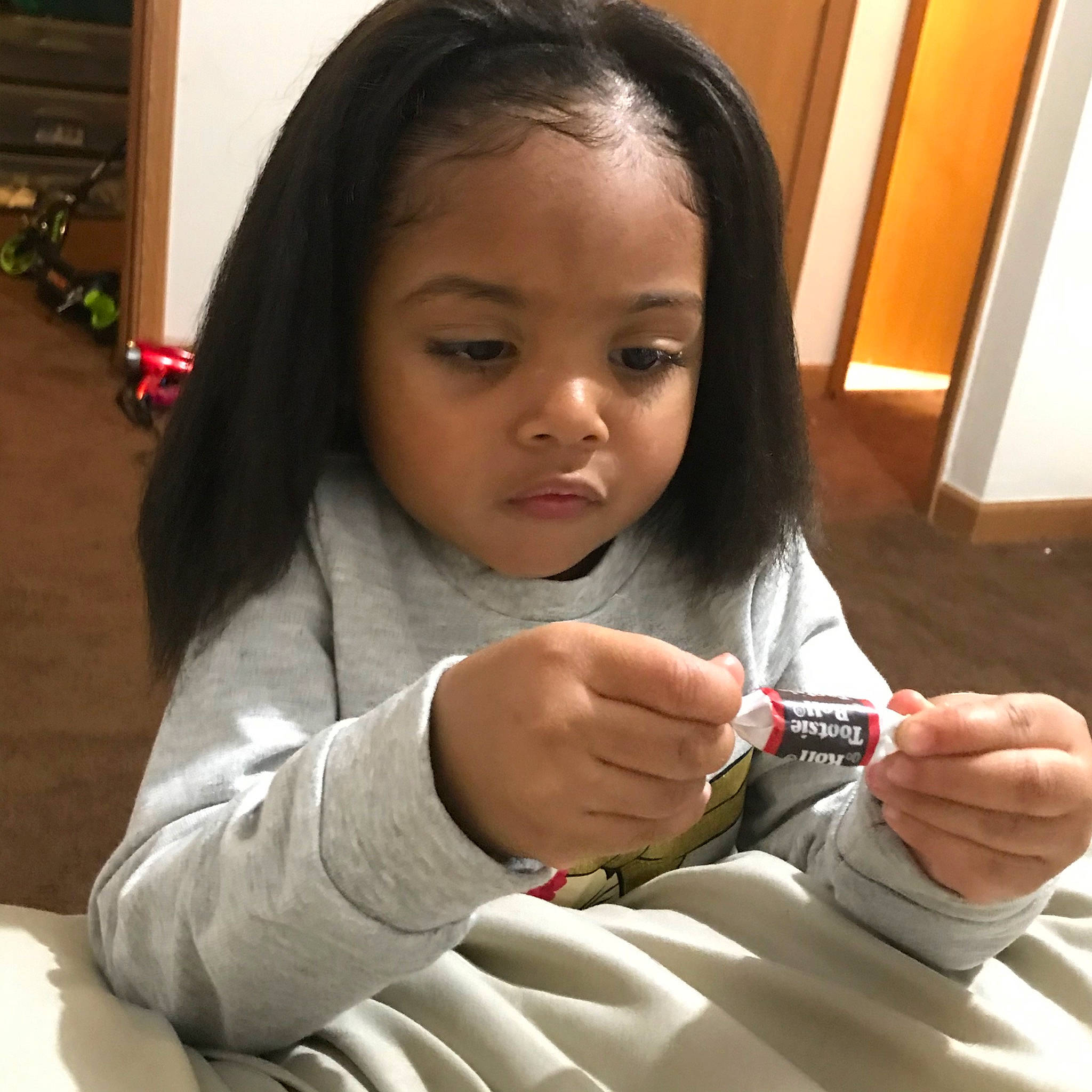 Jayla is registered to the contest to win money with this photo: black_hair, child, finger, lip, long_hair, person