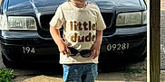 Timmy joined the competition — help win amazing prizes! boy, car, child, city, clothing, face, footwear, head, jeans, male, pants, person, photography, portrait, road, shoe, street, t_shirt, transportation, urban