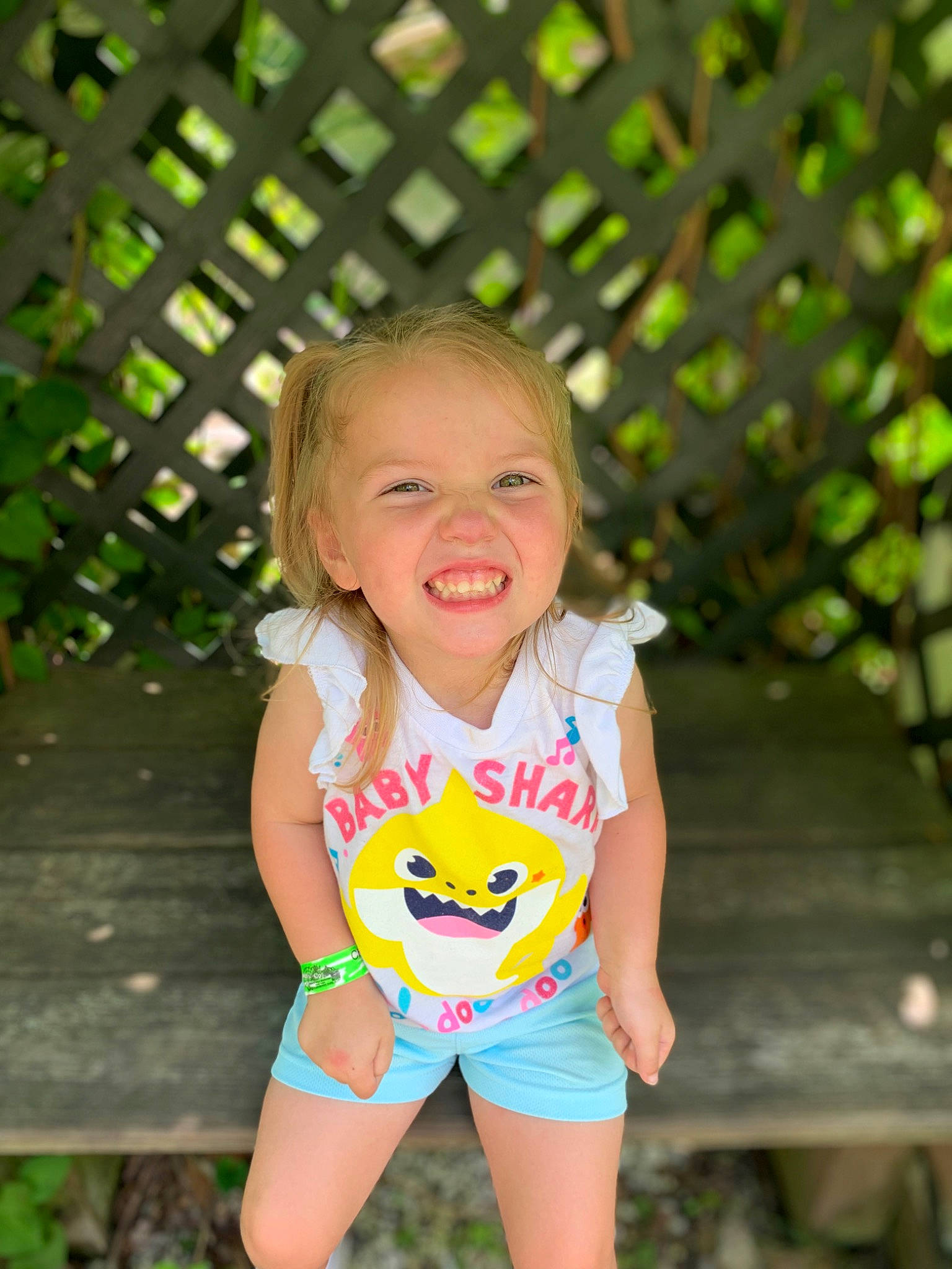 Aspen is registered to the contest to win money with this photo: baby_toddler_clothing, clothing, eye, face, grass, hair, happy, head, iris, joy, leaf, leisure, nature, people_in_nature, person, shorts, skin, smile, summer, t_shirt