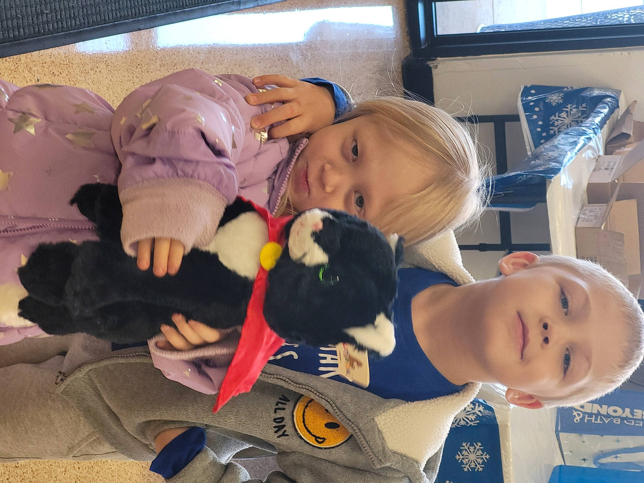 Patrick is registered to the contest to win money with this photo: baby, baby_products, baby_toddler_clothing, baby_toys, car_seat, child, comfort, fun, happy, lap, leisure, person, play, plush, room, sitting, smile, snapshot, stuffed_toy, toddler