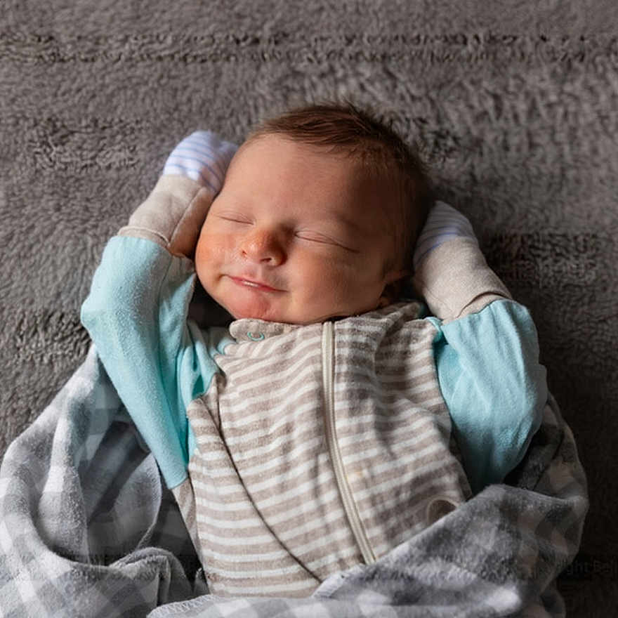 Owen joined the competition — help win amazing prizes! baby, blanket, child, clothing, comfort, cozy, cute, face, indoors, infant, newborn, pajamas, peaceful, portrait, relaxed, rest, sleeping, smiling, soft, warm
