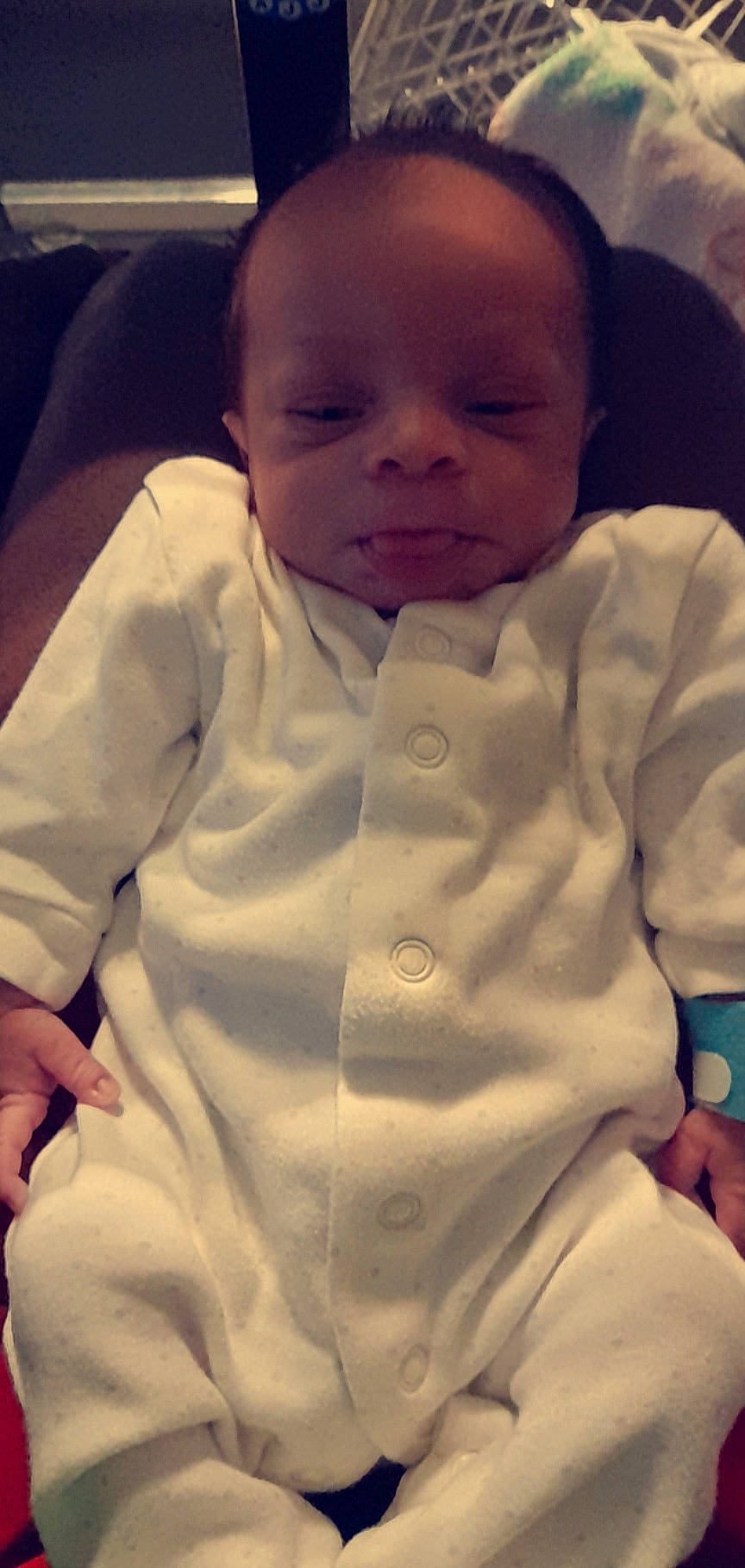 Emmanuel participe au concours pour gagner de l'argent avec cette photo : baby, baby_toddler_clothing, cheek, child, collar, comfort, eyebrow, face, finger, happy, head, iris, jacket, mouth, nose, person, skin, sleeve, smile, toddler