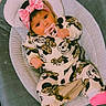 Ruby is registered to the contest to win money with this photo: baby, infant, pacifier, headband, pink, mickey_mouse, leopard_print, clothing, baby_seat, cushion, cute, child, portrait, indoor, sock, adorable, fashion, comfort, looking, person