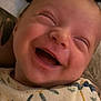 Henri a rejoint le concours — aidez-le/la à gagner de superbes lots ! baby, smiling, laughing, infant, onesie, clothing, face, happy, cute, child, expression, joy, mouth_open, eyes_closed, skin, head, person, indoors, closeup, cheerful