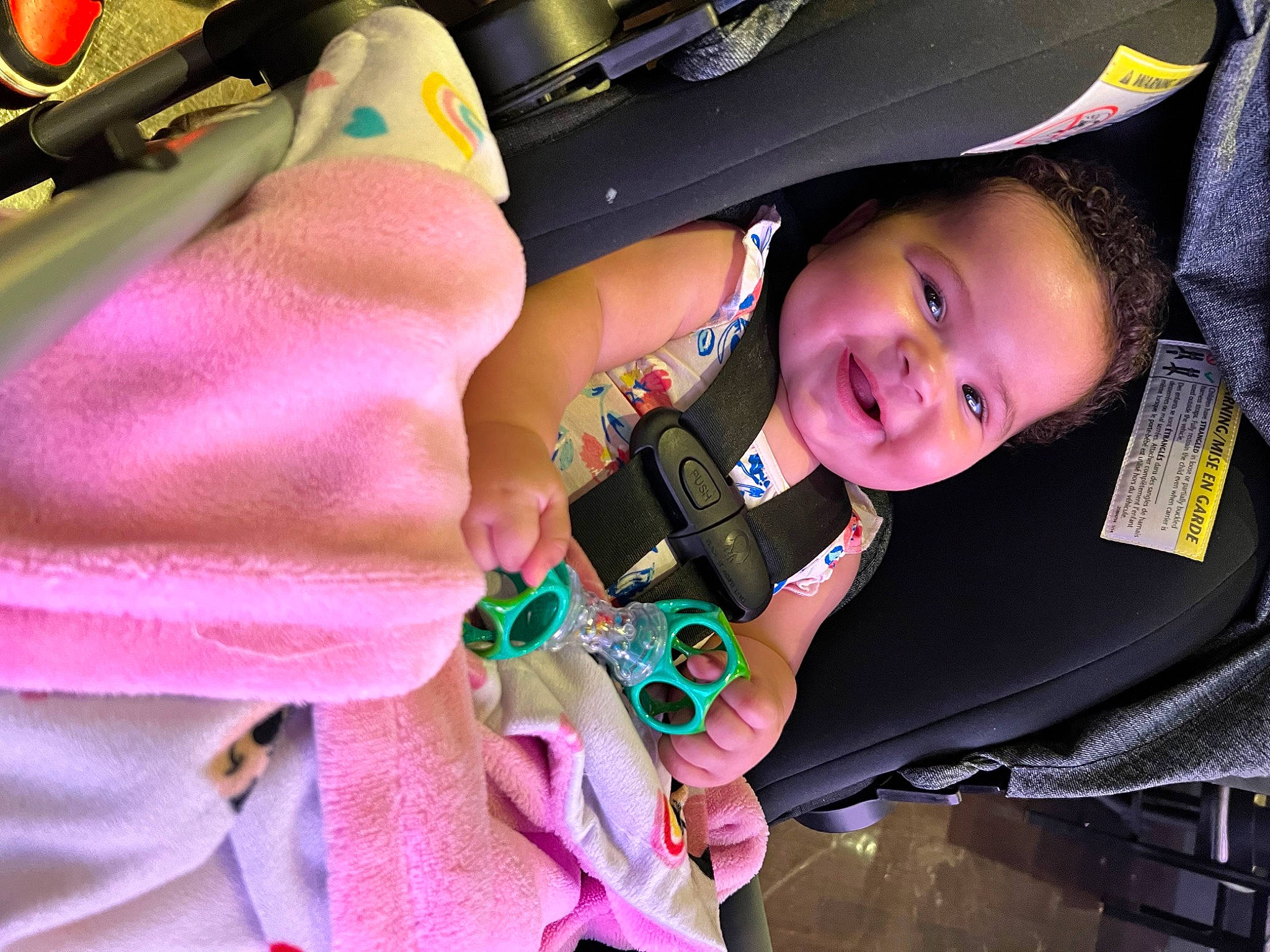Amiyah is registered to the contest to win money with this photo: auto_part, automotive_exterior, baby, baby_carriage, baby_products, car_seat, child, electric_blue, fashion_accessory, flash_photography, fun, happy, joy, leisure, magenta, person, pink, purple, smile, toddler
