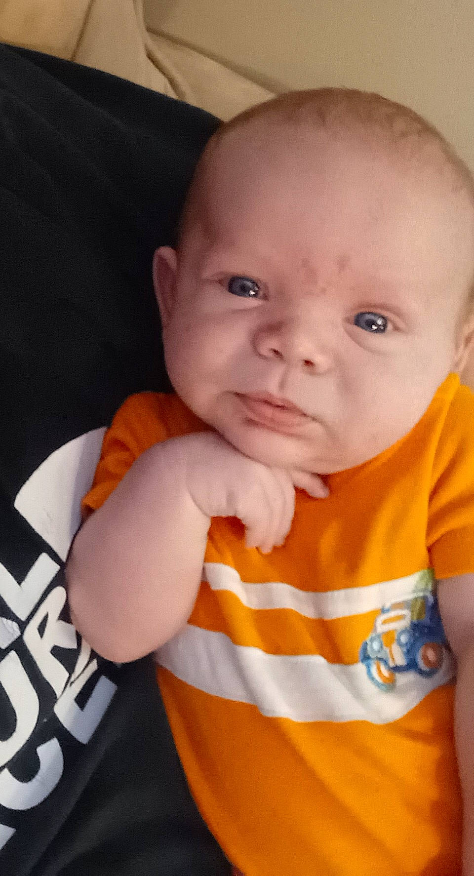 Ethan joined the competition — help win amazing prizes! baby, baby_toddler_clothing, cheek, child, eyebrow, finger, forehead, gesture, happy, iris, lip, mouth, neck, nose, orange, person, skin, sleeve, t_shirt, thumb