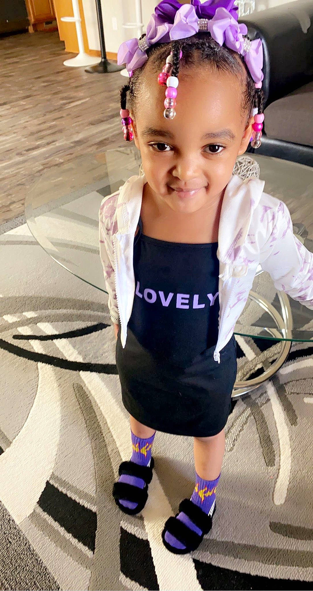 Raziyah is registered to the contest to win money with this photo: baby_toddler_clothing, child, cool, eye, eyelash, face, fun, hair, hairstyle, happy, head, iris, joy, people, person, photograph, pink, purple, sleeve, smile