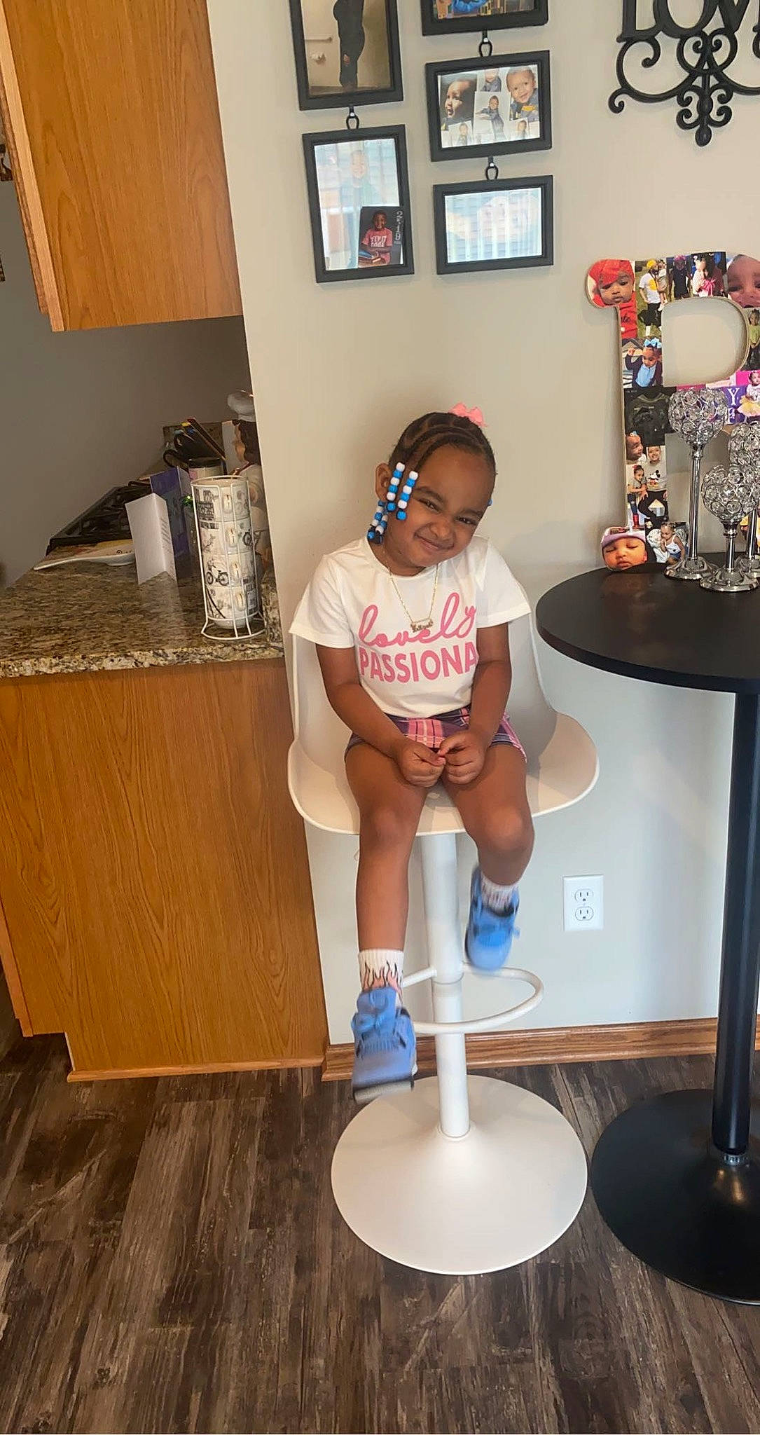 Raziyah joined the competition — help win amazing prizes! eyewear, floor, flooring, hat, human_leg, joint, joy, knee, leg, person, picture_frame, shoe, shorts, shoulder, sneakers, sportswear, stool, t_shirt, table, thigh