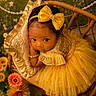 Kai'Lani joined the competition — help win amazing prizes! baby, baby_girl, bow_headband, bracelet, child, closeup, curious, cute, decorative, fashion, flowers, indoors, orange_flowers, pillow, portrait, red_flowers, soft_light, wicker_chair, yellow_dress, yellow_flowers