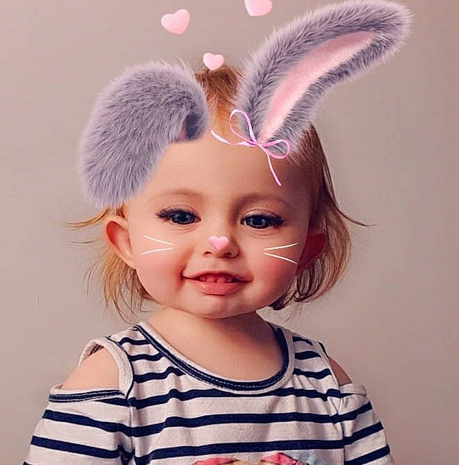 Kameron participe au concours pour gagner de l'argent avec cette photo : baby, cheek, child, costume_accessory, ear, easter_bunny, eye, face, fashion_accessory, head, headgear, headwear, human_body, joy, nose, organ, person, pink, toddler