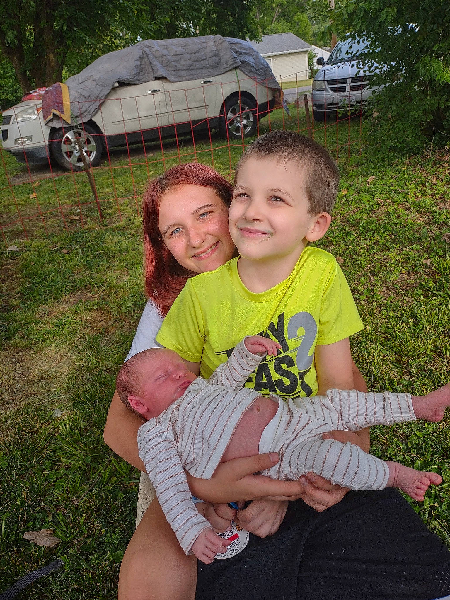 Jerimiha joined the competition — help win amazing prizes! baby, car, grass, grass_family, happy, joy, lap, lawn, leisure, motor_vehicle, person, plant, shorts, smile, summer, t_shirt, tire, toddler, tree, vehicle