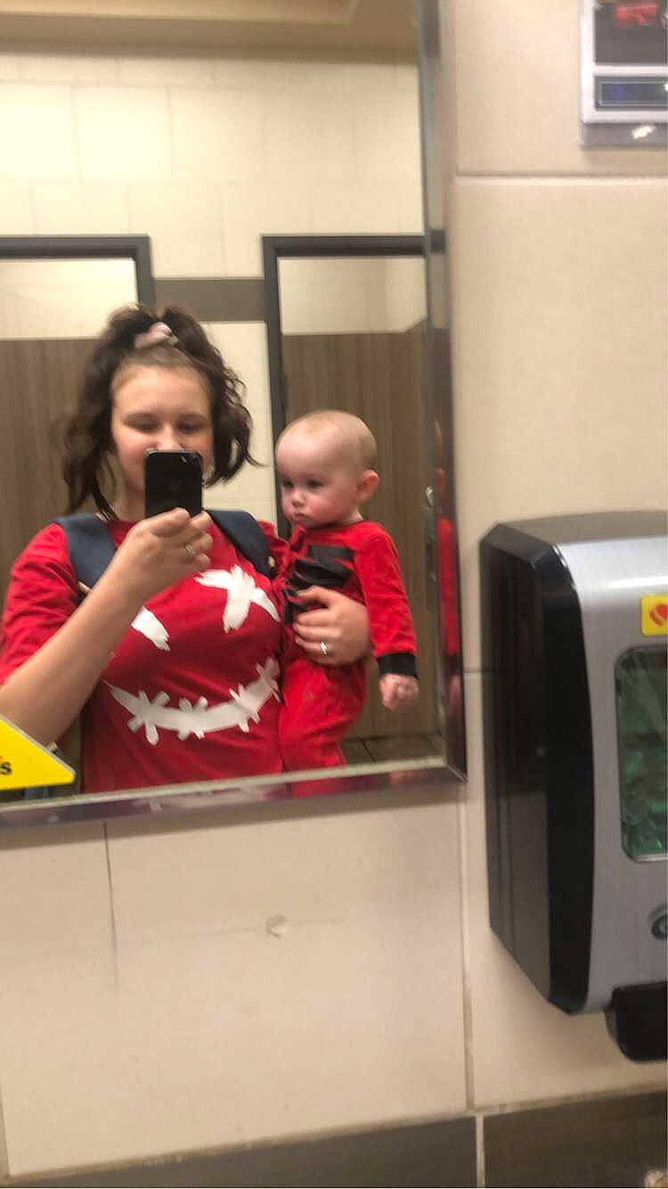 Shyanne is registered to the contest to win money with this photo: baby, child, conversation, display_device, electronic_device, event, eyewear, fun, gas, happy, home_appliance, machine, major_appliance, mirror, person, reflection, room, selfie, sitting, t_shirt