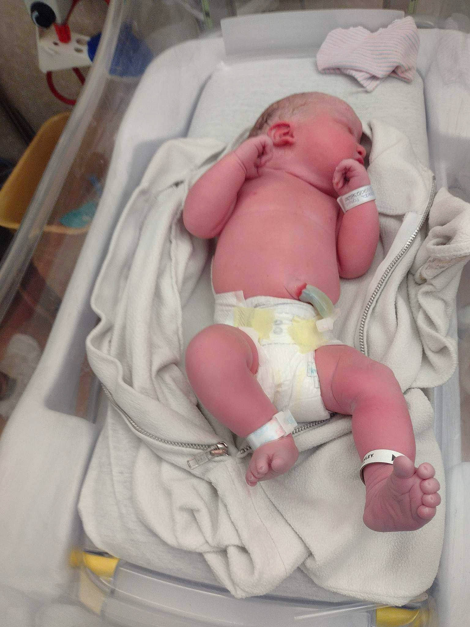 Letty is registered to the contest to win money with this photo: abdomen, baby, baby_products, baby_safety, baby_sleeping, baby_toddler_clothing, bedding, bedtime, cheek, chest, child, comfort, diaper, human_body, infant_bed, linens, mouth, person, stomach, thumb