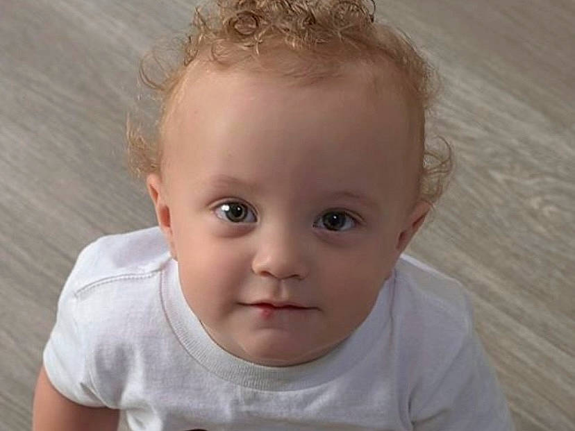 Jaxton is registered to the contest to win money with this photo: baby, baby_toddler_clothing, blond, brown_hair, cheek, child, chin, close_up, eyebrow, eyelash, flash_photography, hair, happy, iris, lip, nose, person, skin, sleeve, toddler