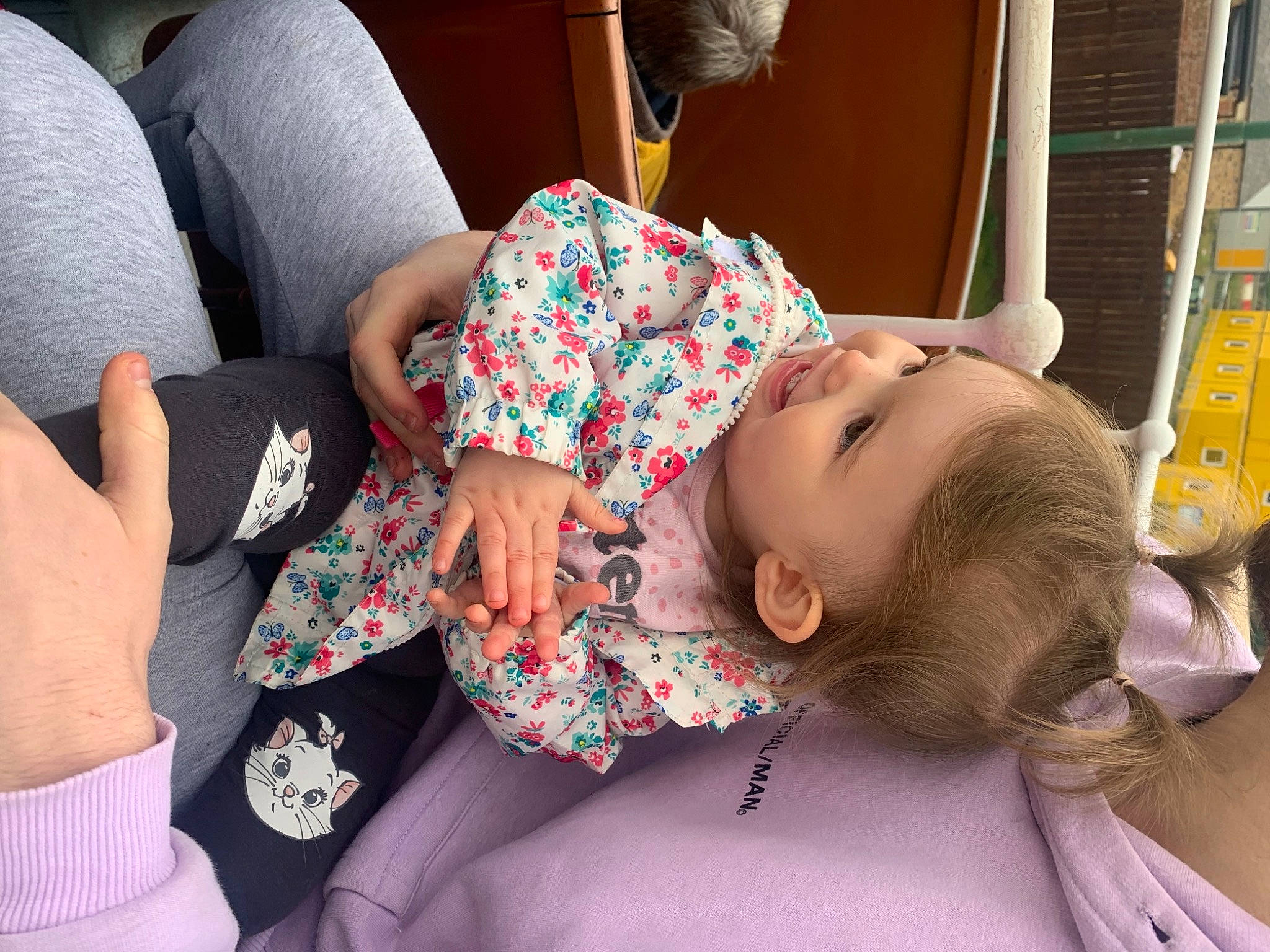 Maya joined the competition — help win amazing prizes! baby, baby_products, baby_toddler_clothing, car_seat, cheek, child, comfort, finger, happy, human_leg, linens, nap, nose, pattern, person, sitting, skin, smile, textile, thigh