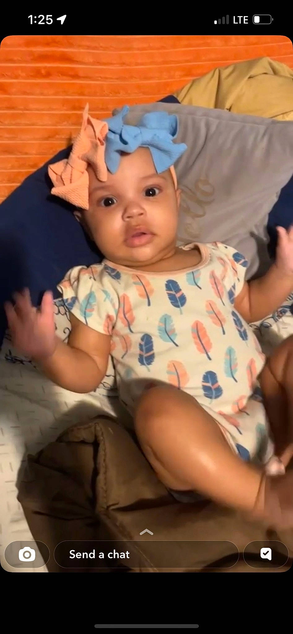 Kailani is registered to the contest to win money with this photo: baby, baby_toddler_clothing, cap, cheek, child, comfort, eye, facial_expression, fashion_accessory, fun, happy, hat, headwear, human_leg, mouth, nose, person, pink, sitting, skin