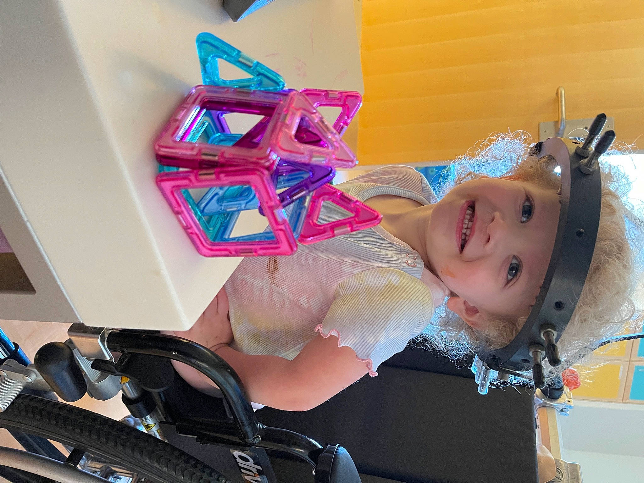 Mackenna joined the competition — help win amazing prizes! audio_equipment, auto_part, automotive_design, automotive_wheel_system, baby_products, bag, costume, eyewear, fashion_accessory, fun, headwear, human_leg, joy, luggage_and_bags, magenta, person, personal_protective_equipment, product, purple, room