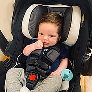 Robert Ray joined the competition — help win amazing prizes! baby, blue_eyes, brown_hair, buckle, car_seat, carseat, cute, gray_pants, hand_to_mouth, harness, indoor, infant, onesie, pacifier, portrait, seat_pad, smiling, socks, stroller, toy
