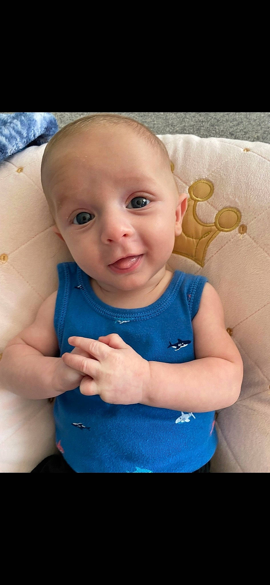 Kohen is registered to the contest to win money with this photo: azure, baby, baby_toddler_clothing, cheek, child, eye, face, facial_expression, finger, flash_photography, gesture, happy, iris, lip, person, pink, product, skin, sleeve, textile