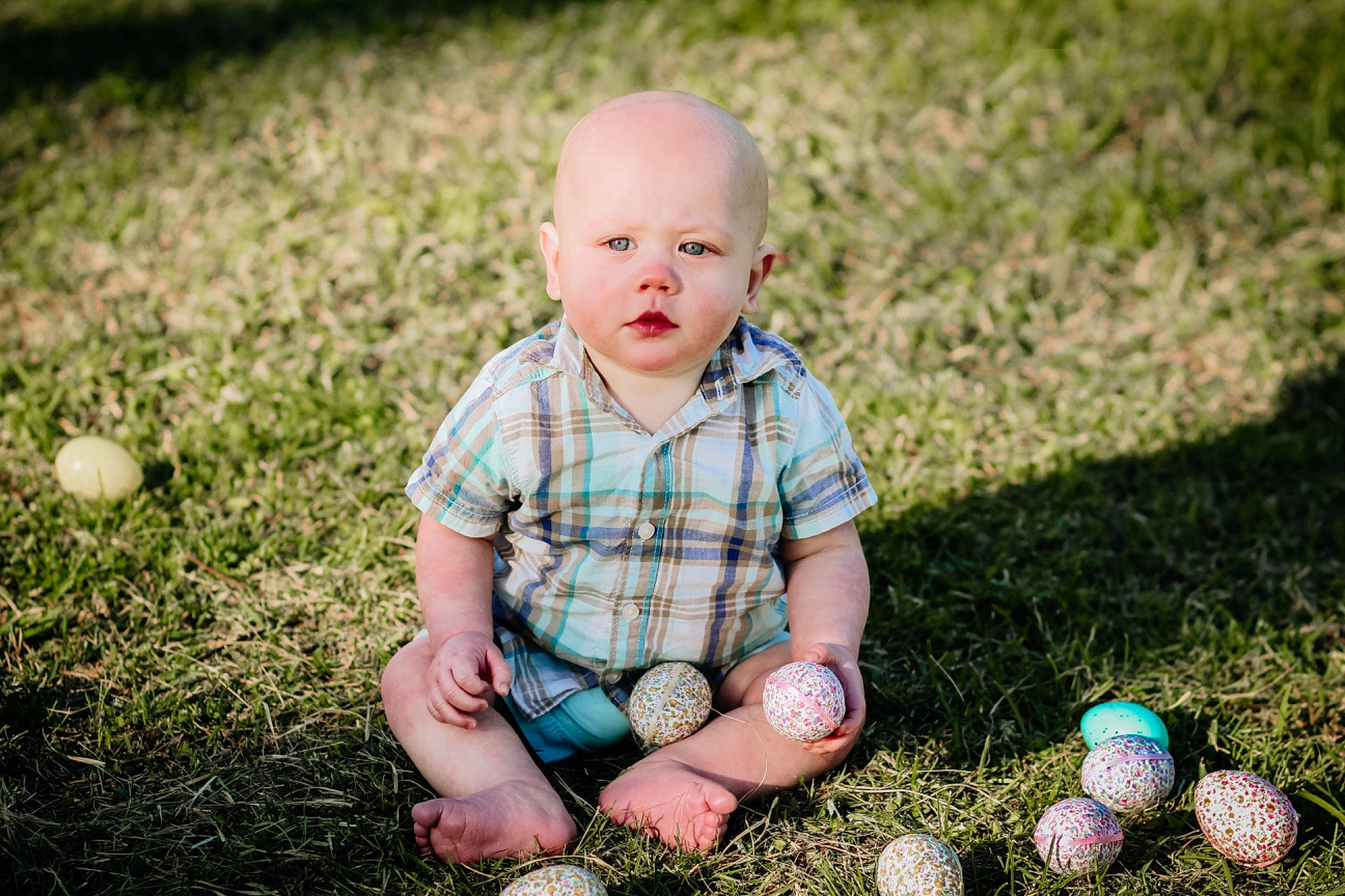 Conner is registered to the contest to win money with this photo: baby, baby_toddler_clothing, ball, beauty, child, flash_photography, fun, grass, grass_family, grassland, happy, pattern, people_in_nature, person, plaid, plant, sunlight, tartan, toddler, tree