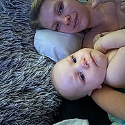 Jacob joined the competition — help win amazing prizes! children, toddler, baby, infant, siblings, faces, portrait, lying_down, cuddling, smiling, indoors, rug, blanket, pillow, home, family, closeup, blue_eyes, bare_shoulders, cozy
