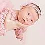 baby, newborn, infant, pink, lace, headband, hand, soft, portrait, cute, child, toddler, face, expression, gentle, holding, pastel, delicate, young, adorable