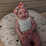Iris joined the competition — help win amazing prizes! baby, bow, child, comfort, cute, face, hand, happy, headband, indoors, infant, legs, pillow, sheep_pattern, shorts, sitting, skin, sleeveless_top, smiling, watermelon_pattern
