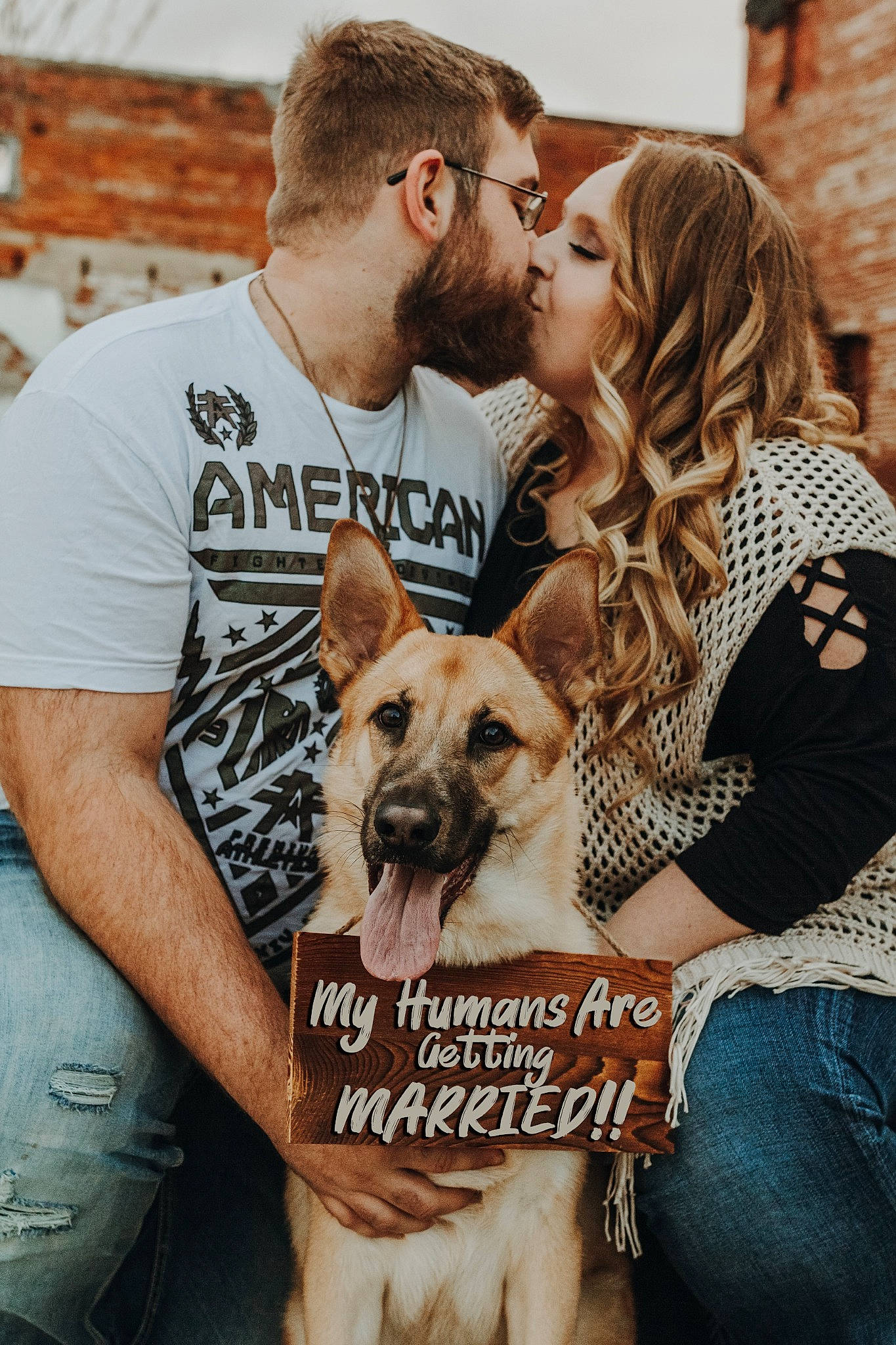 Loki joined the competition — help win amazing prizes! canidae, carnivore, companion_dog, dog, dog_breed, event, eyewear, fawn, fur, gesture, happy, human, interaction, kiss, love, mammal, romance, sporting_group, street_fashion, t_shirt