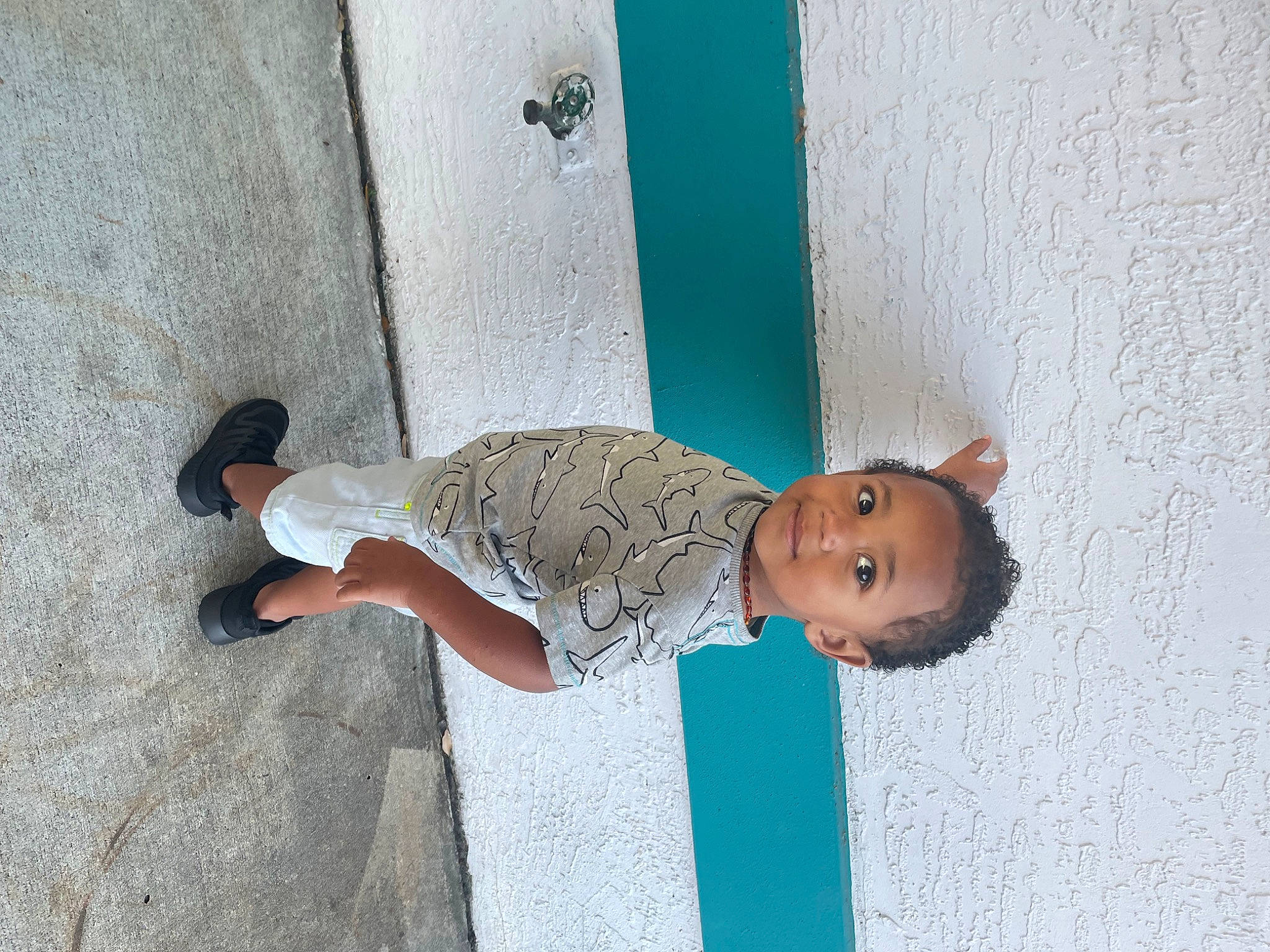 Jalen joined the competition — help win amazing prizes! baby, baby_toddler_clothing, child, concrete, door, elbow, flooring, foot, fun, happy, human_leg, person, plaster, room, sitting, sleeve, smile, toddler, wall, water