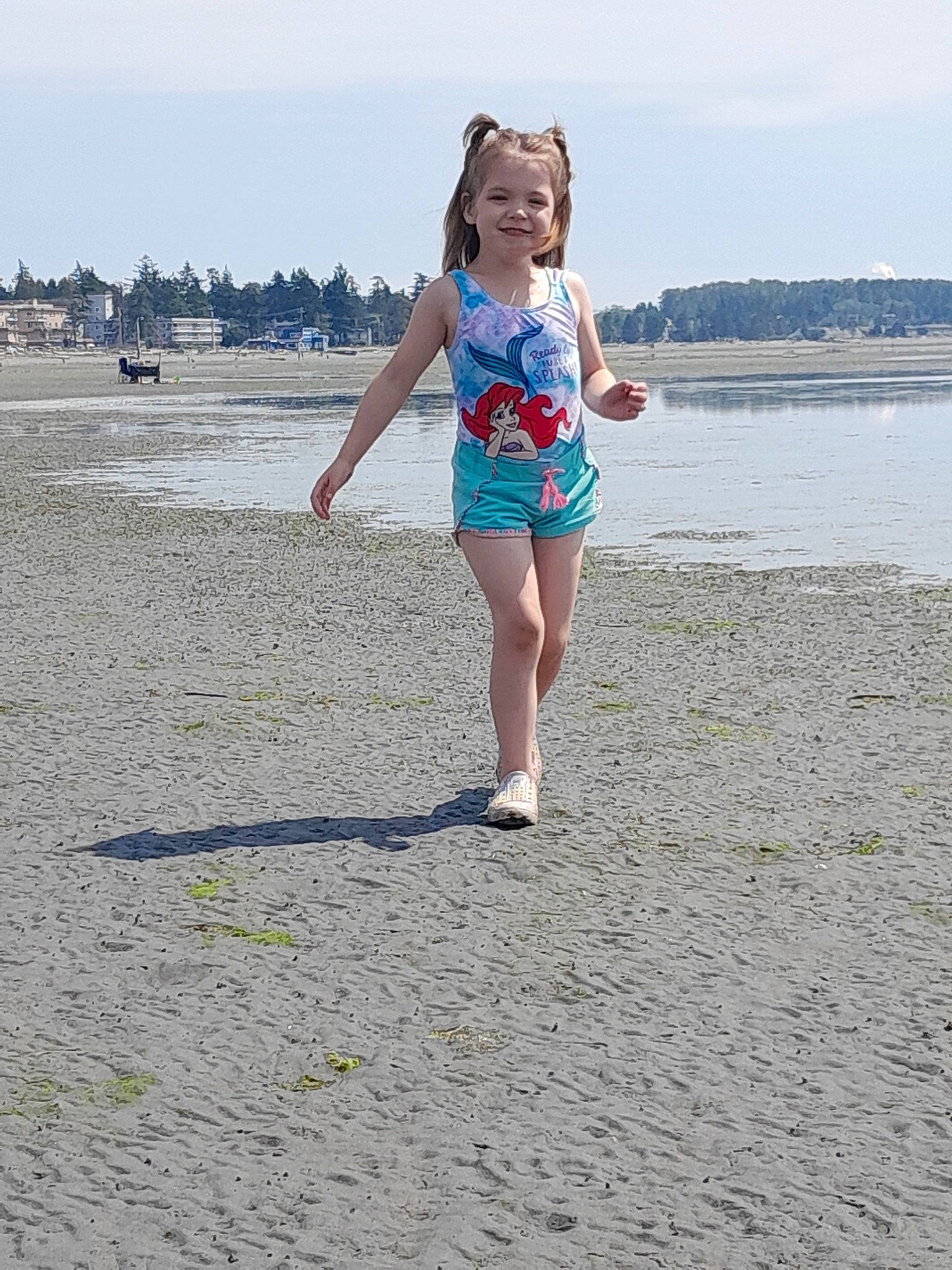 Luciana joined the competition — help win amazing prizes! barefoot, beach, child, cloud, electric_blue, fun, happy, horizon, human_leg, joy, leg, leisure, people_in_nature, people_on_beach, person, recreation, sand, shore, sky, toddler