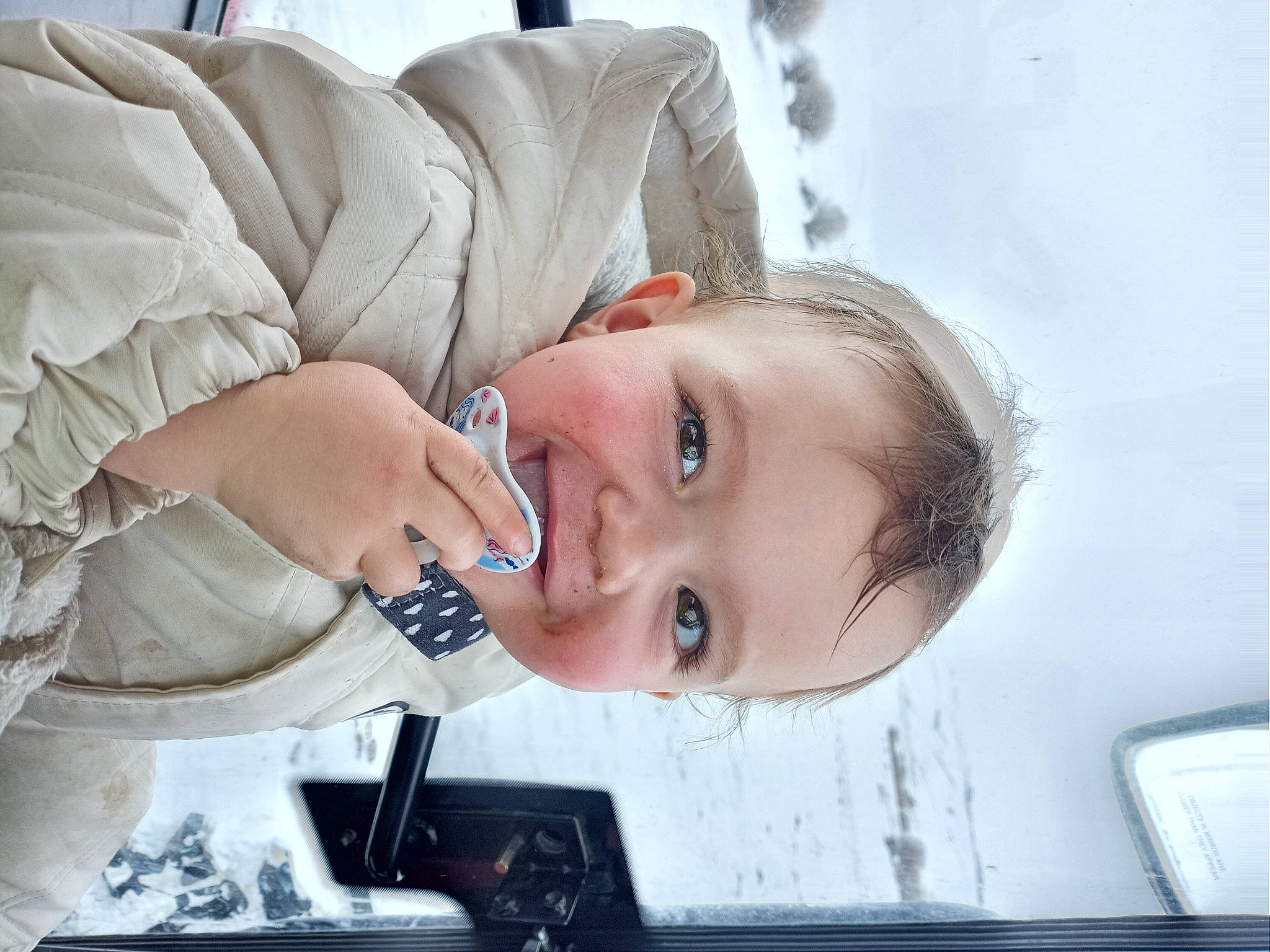 Ziva is registered to the contest to win money with this photo: auto_part, blond, child, comfort, eyebrow, eyelash, flash_photography, happy, iris, jaw, linens, lip, neck, nose, person, portrait_photography, room, sitting, smile, toddler