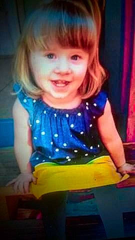 Kyrstin is registered to the contest to win money with this photo: baby, blond, brown_hair, cheek, child, child_model, eye, fun, iris, joy, person, play, product, sitting, smile, thumb, toddler