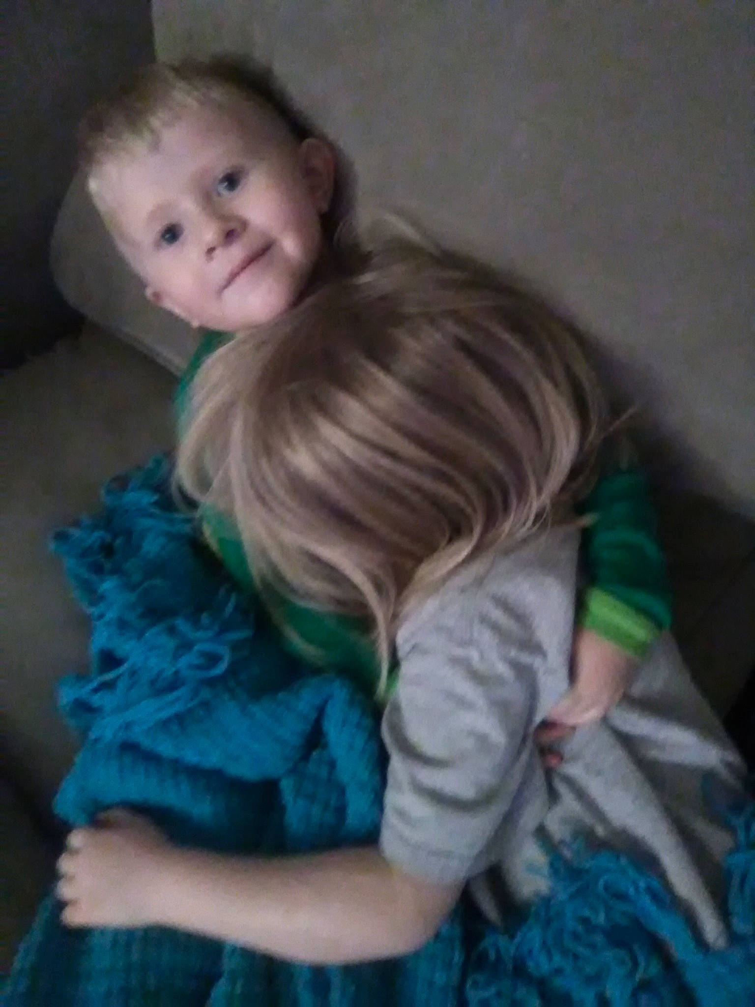 Joseph Jr is registered to the contest to win money with this photo: baby, brown_hair, cheek, child, ear, eye, fun, hair, iris, long_hair, nose, person, play, sibling, sitting, skin, smile, toddler, turquoise