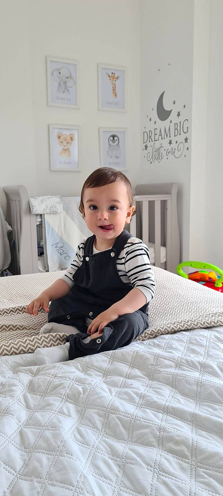 Marc joined the competition — help win amazing prizes! baby, baby_toddler_clothing, bed, bed_sheet, bedding, bedroom, comfort, flash_photography, floor, flooring, linens, pattern, person, room, sitting, sleeve, smile, t_shirt, textile, toddler