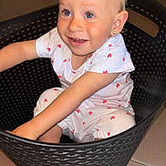 Peyton participe au concours pour gagner de l'argent avec cette photo : baby, basket, blonde_hair, blue_eyes, child, cute, earrings, floor_tiles, happy, hearts_pattern, home, indoor, person, plastic_basket, playful, portrait, sitting, smiling, toddler, white_clothing