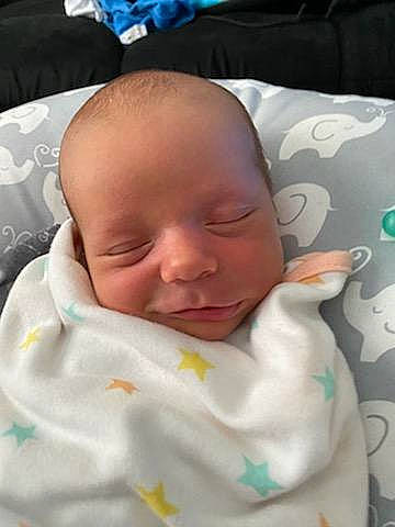 Exavier is registered to the contest to win money with this photo: baby, baby_products, baby_toddler_clothing, bedtime, cheek, child, comfort, face, head, linens, person, skin, sleep, smile, textile, thumb, toddler