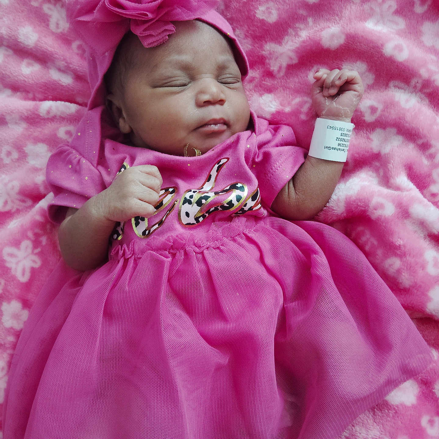 Sevyn joined the competition — help win amazing prizes! adorable, baby, blanket, child, closeup, cute, foot, hand, headband, hospital_band, indoors, infant, newborn, peaceful, pink_dress, portrait, resting, sleeping, soft_texture, tulle_skirt