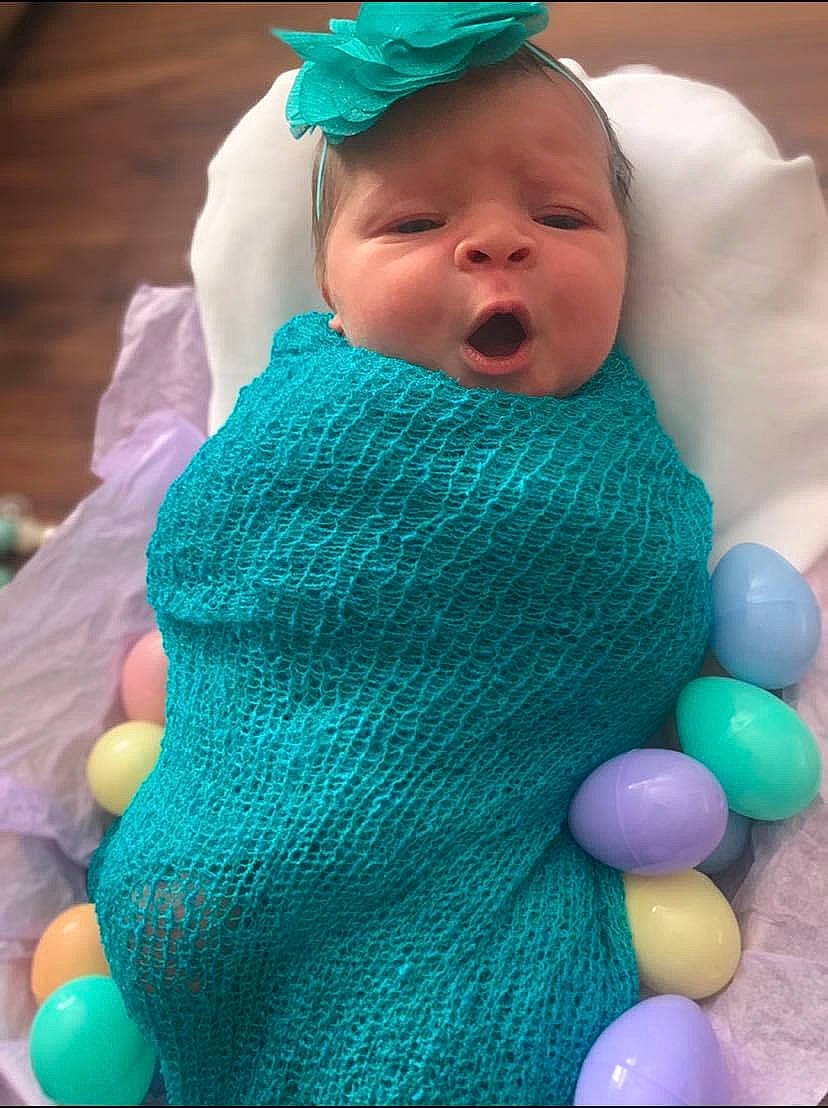 Layla joined the competition — help win amazing prizes! aqua, arm, azure, baby, baby_products, baby_toddler_clothing, blue, cap, child, electric_blue, finger, fun, grass, green, happy, outerwear, pattern, person, purple, toddler