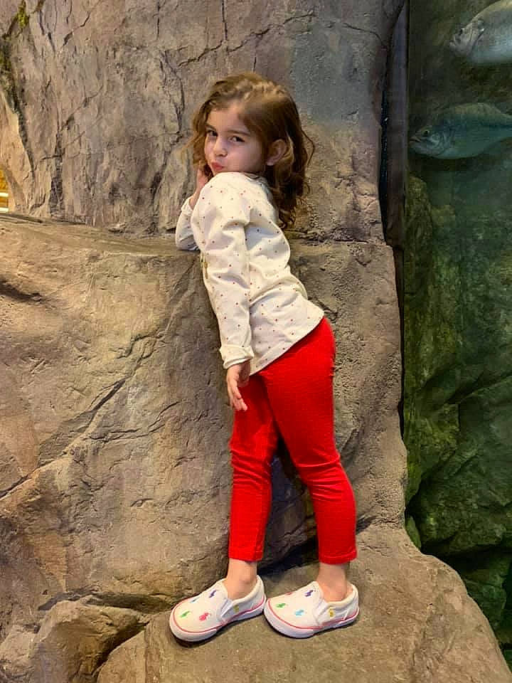 Alaina joined the competition — help win amazing prizes! bedrock, branch, flash_photography, formation, happy, human_leg, knee, leg, leisure, people_in_nature, person, shoe, sneakers, t_shirt, thigh, trunk, waist, wall, wood, woody_plant