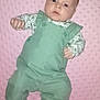 baby, bodypart, clothing, coat, dress, face, finger, formalwear, hand, happy, head, longsleeve, newborn, pants, person, photography, portrait, shirt, sleeve, toy