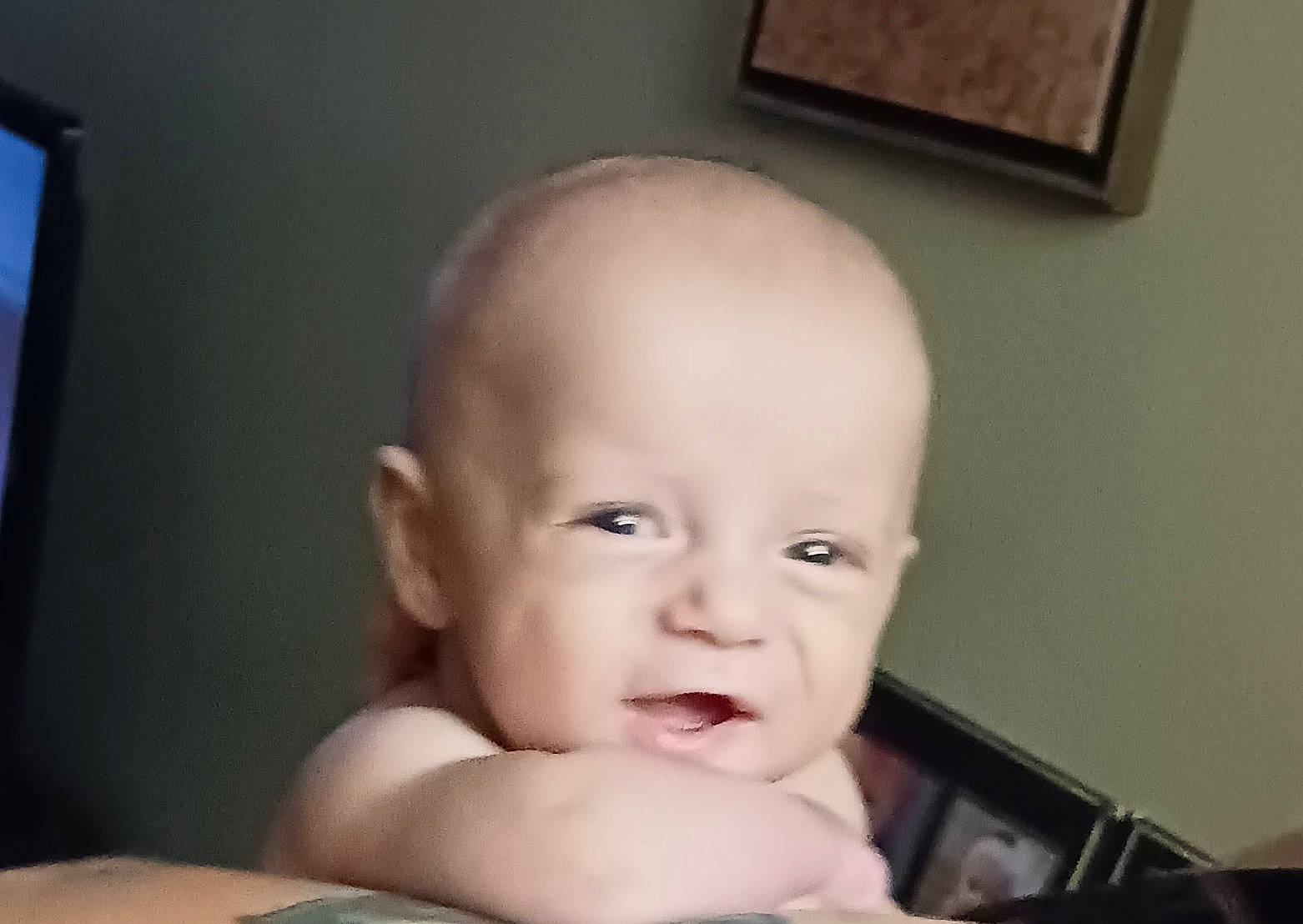 Kingston is registered to the contest to win money with this photo: baby, cheek, child, chin, comfort, ear, eyebrow, eyelash, gesture, happy, iris, jaw, lip, mouth, nail, nose, person, sitting, smile, thumb