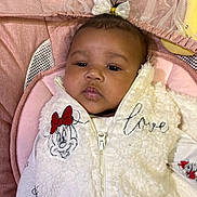 Zalani joined the competition — help win amazing prizes! baby, bow, child, clothing, cute, fabric, face, indoors, infant, jacket, person, pink, plush_toy, portrait, red, smile, soft, star, white, zipper