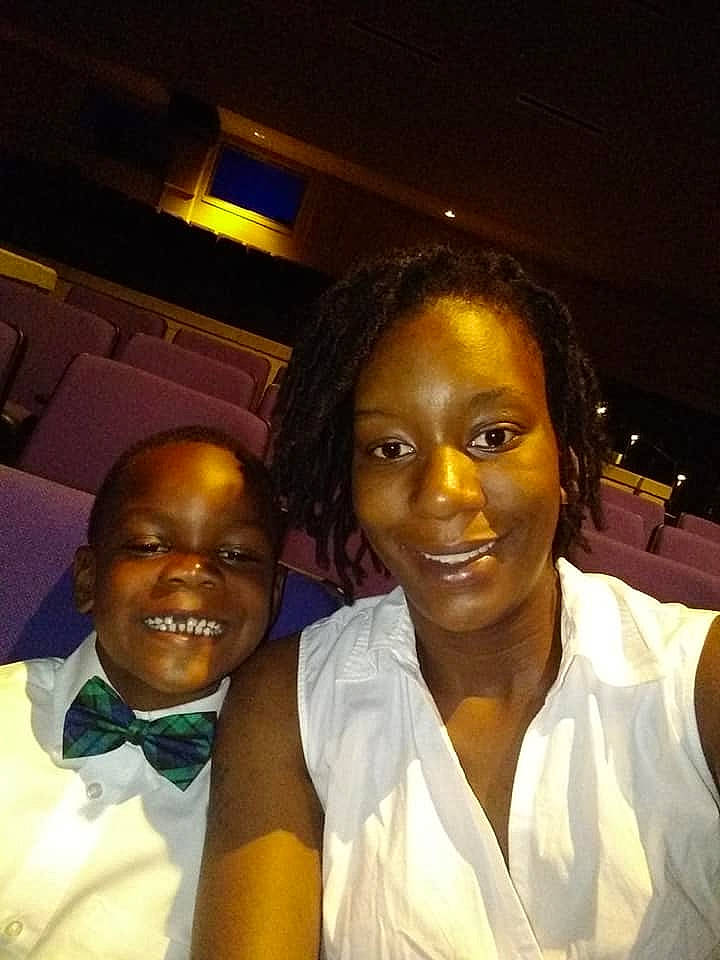 Zamari joined the competition — help win amazing prizes! black_hair, bow_tie, collar, hairstyle, happy, joy, laugh, mouth, nose, person, school_uniform, smile, tan, tie, tooth